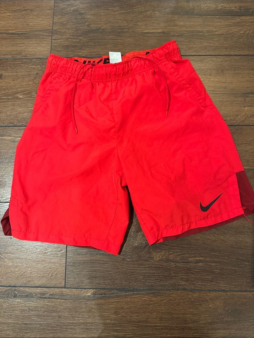 Nike Men's Bright Red Athletic Shorts with Swoosh